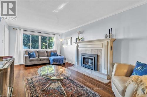 37 - 295 Water Street, Guelph (Old University), ON - Indoor Photo Showing Living Room With Fireplace