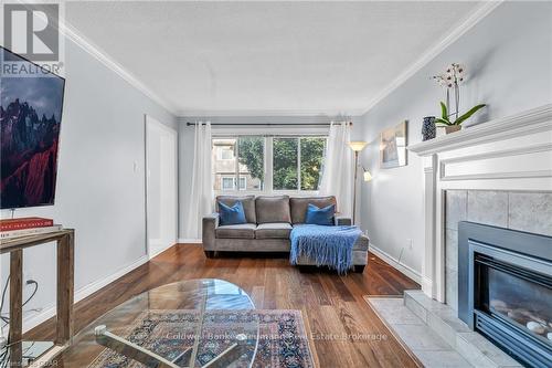 37 - 295 Water Street, Guelph (Old University), ON - Indoor Photo Showing Living Room With Fireplace