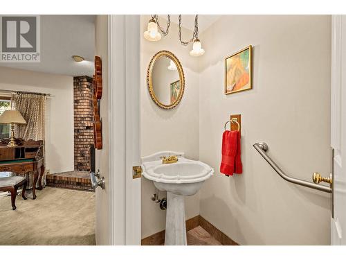 Powder room on main level - 1995 Burtch Road Unit# 108, Kelowna, BC - Indoor Photo Showing Bathroom