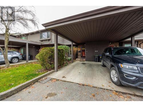 One covered parking spot in the carport - 1995 Burtch Road Unit# 108, Kelowna, BC - Outdoor