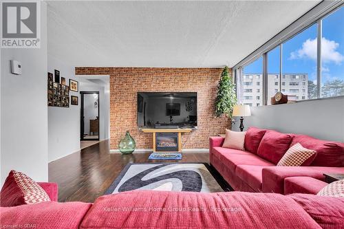 108 - 89 Westwood Road, Guelph (West Willow Woods), ON - Indoor Photo Showing Living Room With Fireplace