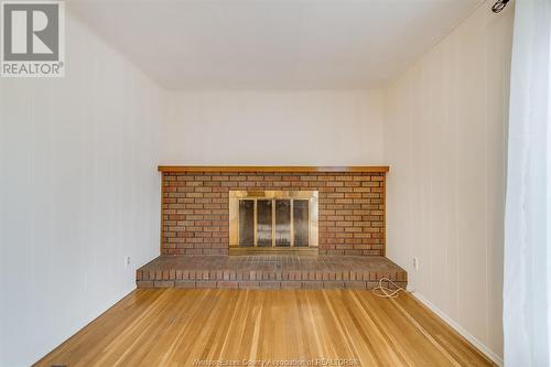 3240 St. Patrick'S Drive, Windsor, ON - Indoor Photo Showing Living Room With Fireplace