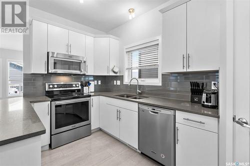 443 Secord Way, Saskatoon, SK - Indoor Photo Showing Kitchen With Double Sink