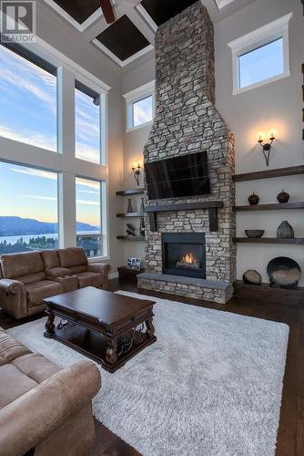 426 Audubon Court, Kelowna, BC - Indoor Photo Showing Living Room With Fireplace