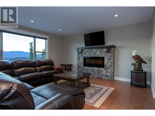 426 Audubon Court, Kelowna, BC - Indoor Photo Showing Living Room With Fireplace