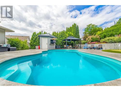 1492 Longley Crescent, Kelowna, BC - Outdoor With In Ground Pool With Backyard