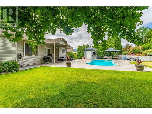 1492 Longley Crescent, Kelowna, BC - Outdoor With In Ground Pool With Deck Patio Veranda With Backyard