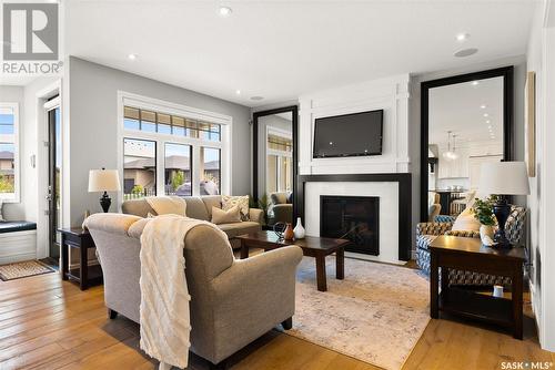 4302 Chuka Drive, Regina, SK - Indoor Photo Showing Living Room With Fireplace