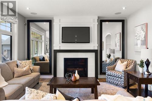 4302 Chuka Drive, Regina, SK - Indoor Photo Showing Living Room With Fireplace