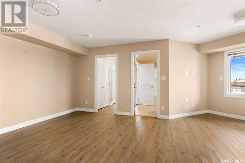 213 5303 Universal Crescent, Regina, SK - Indoor Photo Showing Other Room