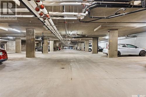 213 5303 Universal Crescent, Regina, SK - Indoor Photo Showing Garage