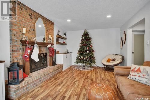 105 Kingsmere Court, Saskatoon, SK - Indoor Photo Showing Living Room With Fireplace