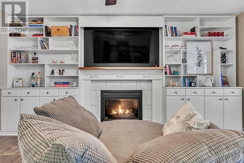 4100 Wellington Drive, Vernon, BC - Indoor Photo Showing Other Room With Fireplace