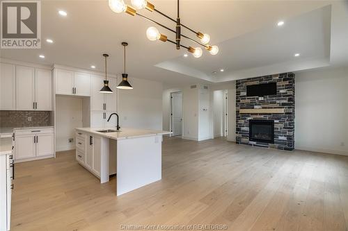 16 Bloomington Way, Chatham, ON - Indoor Photo Showing Kitchen With Fireplace