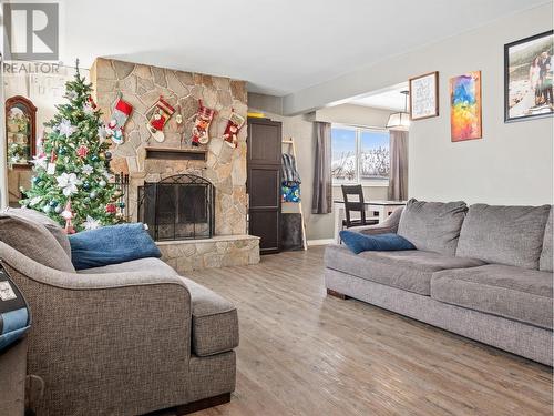 301 95 Avenue, Dawson Creek, BC - Indoor Photo Showing Living Room With Fireplace