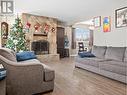 301 95 Avenue, Dawson Creek, BC  - Indoor Photo Showing Living Room With Fireplace 