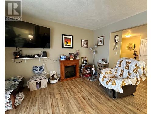 805 96 Avenue Unit# 3, Dawson Creek, BC - Indoor Photo Showing Living Room With Fireplace