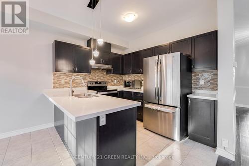 569 Murray Meadows Place, Milton, ON - Indoor Photo Showing Kitchen With Double Sink With Upgraded Kitchen