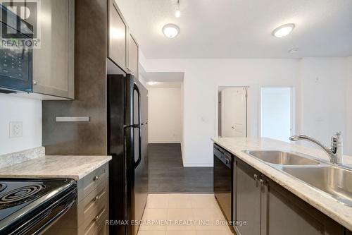 606 - 85 Robinson Street, Hamilton, ON - Indoor Photo Showing Kitchen With Double Sink