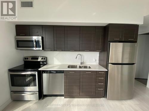 3606 - 2212 Lakeshore Road W, Toronto, ON - Indoor Photo Showing Kitchen With Double Sink