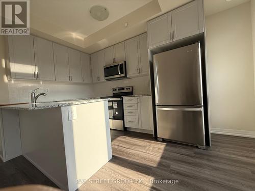 114 - 1573 Rose Way, Milton, ON - Indoor Photo Showing Kitchen With Stainless Steel Kitchen With Upgraded Kitchen