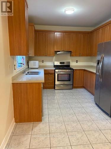 4781 Half Moon Grove, Mississauga, ON - Indoor Photo Showing Kitchen With Double Sink