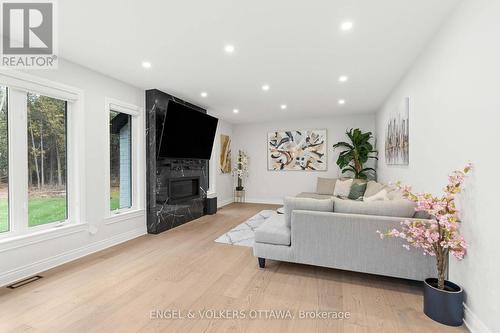 1108 Meadowshire Way, Ottawa, ON - Indoor Photo Showing Living Room With Fireplace