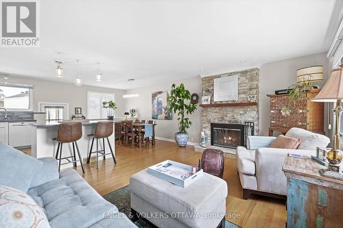 11 Stillwater Drive, Ottawa, ON - Indoor Photo Showing Living Room With Fireplace