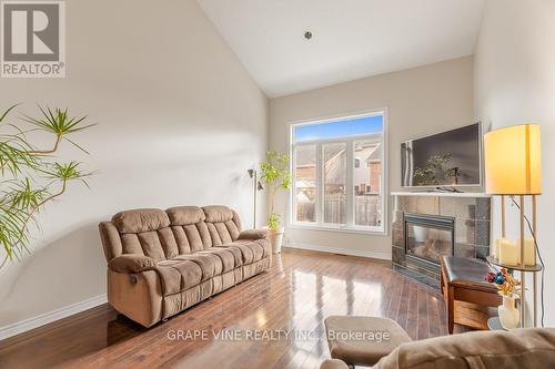 349 Grey Seal Circle, Ottawa, ON - Indoor Photo Showing Living Room With Fireplace