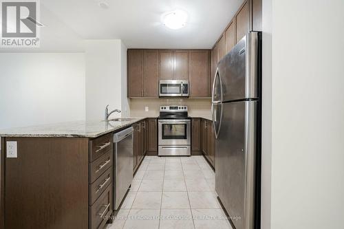 317 - 39 New Delhi Drive, Markham, ON - Indoor Photo Showing Kitchen With Stainless Steel Kitchen