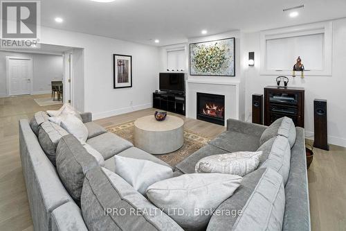 47 Ambleside Avenue, Toronto, ON - Indoor Photo Showing Living Room With Fireplace