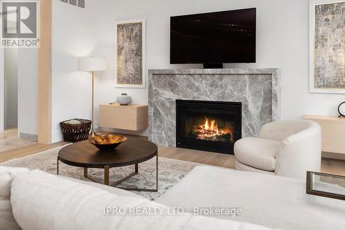 47 Ambleside Avenue, Toronto, ON - Indoor Photo Showing Living Room With Fireplace