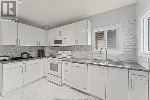 1353 Mckay, Windsor, ON - Indoor Photo Showing Kitchen With Double Sink