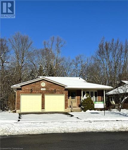 View of front of property with a porch and a garage - 431 Northlake Drive, Waterloo, ON - Outdoor With Facade