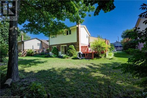 Back of house with a wooden deck and a yard - 431 Northlake Drive, Waterloo, ON - Outdoor