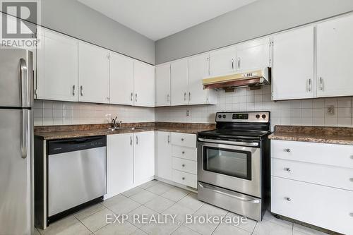 414 - 1703 Mccowan Road, Toronto, ON - Indoor Photo Showing Kitchen With Double Sink