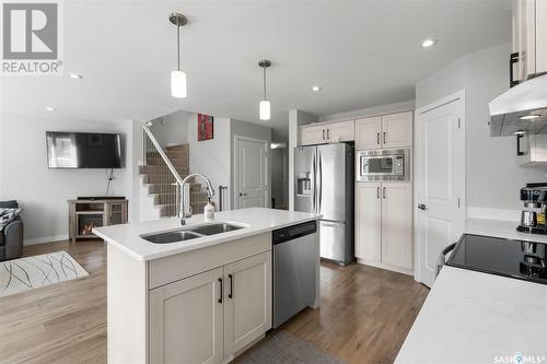 202 Stilling Union, Saskatoon, SK - Indoor Photo Showing Kitchen With Double Sink With Upgraded Kitchen