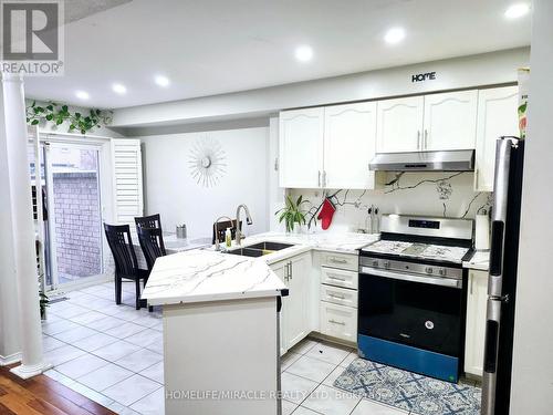 45 Ozner Court N, Brampton, ON - Indoor Photo Showing Kitchen With Double Sink