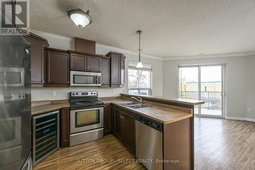 306 - 435 Colborne Street, London, ON - Indoor Photo Showing Kitchen With Stainless Steel Kitchen With Double Sink