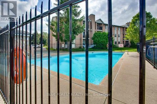 307 - 2228 Trafalgar Street, London, ON -  Photo Showing Other Room With In Ground Pool