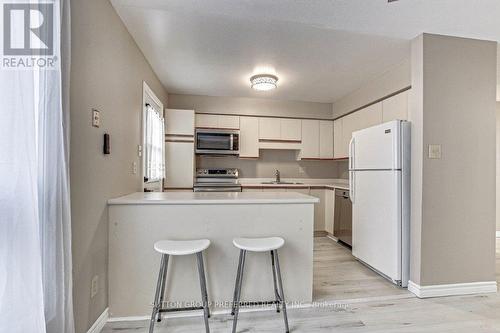 30 - 925 Lawson Road, London, ON - Indoor Photo Showing Kitchen With Double Sink