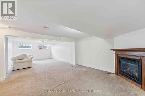 760 Lakebreeze Circle, Ottawa, ON - Indoor Photo Showing Living Room With Fireplace