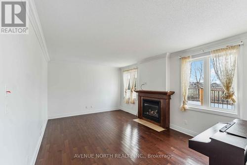 760 Lakebreeze Circle, Ottawa, ON - Indoor Photo Showing Living Room With Fireplace