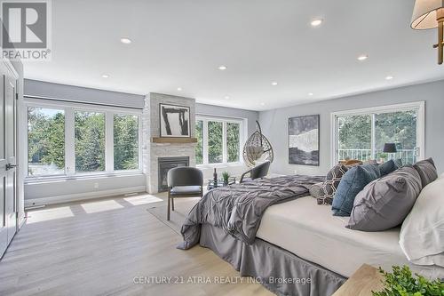 7580 16Th Side Road, King, ON - Indoor Photo Showing Bedroom With Fireplace