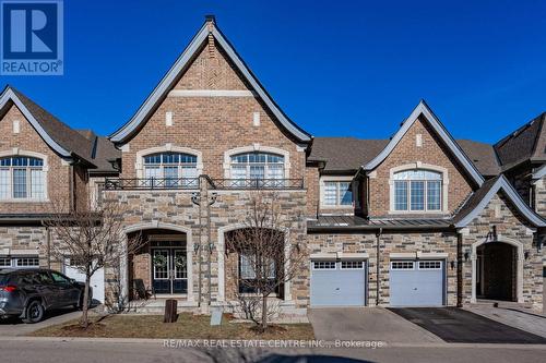 2453 Village Common, Oakville, ON - Outdoor With Facade