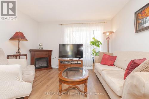 26 Candlewood Court, Brampton, ON - Indoor Photo Showing Living Room With Fireplace