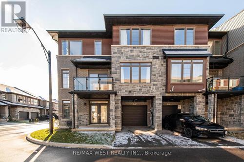 104 - 30 Time Square Boulevard, Hamilton, ON - Outdoor With Balcony With Facade