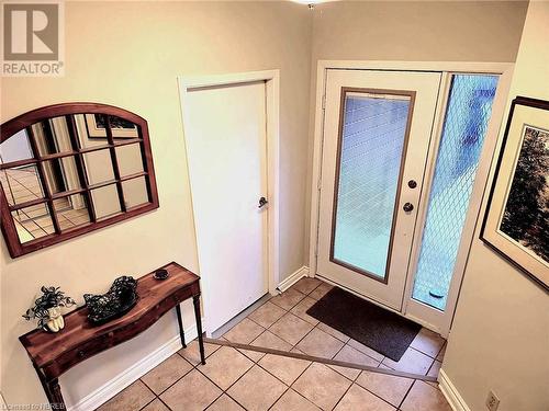 View of tiled foyer entrance - 555 Main Street S Unit# 5, Callander, ON - Indoor Photo Showing Other Room