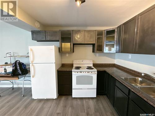 916 Athol Street, Regina, SK - Indoor Photo Showing Kitchen With Double Sink