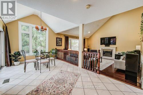 610 Stonebury Crescent, Waterloo, ON - Indoor Photo Showing Dining Room With Fireplace